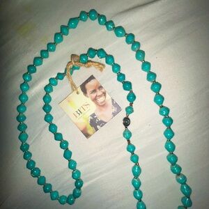 BITS Beautiful 16 inch recycled material turquoise colored necklace.